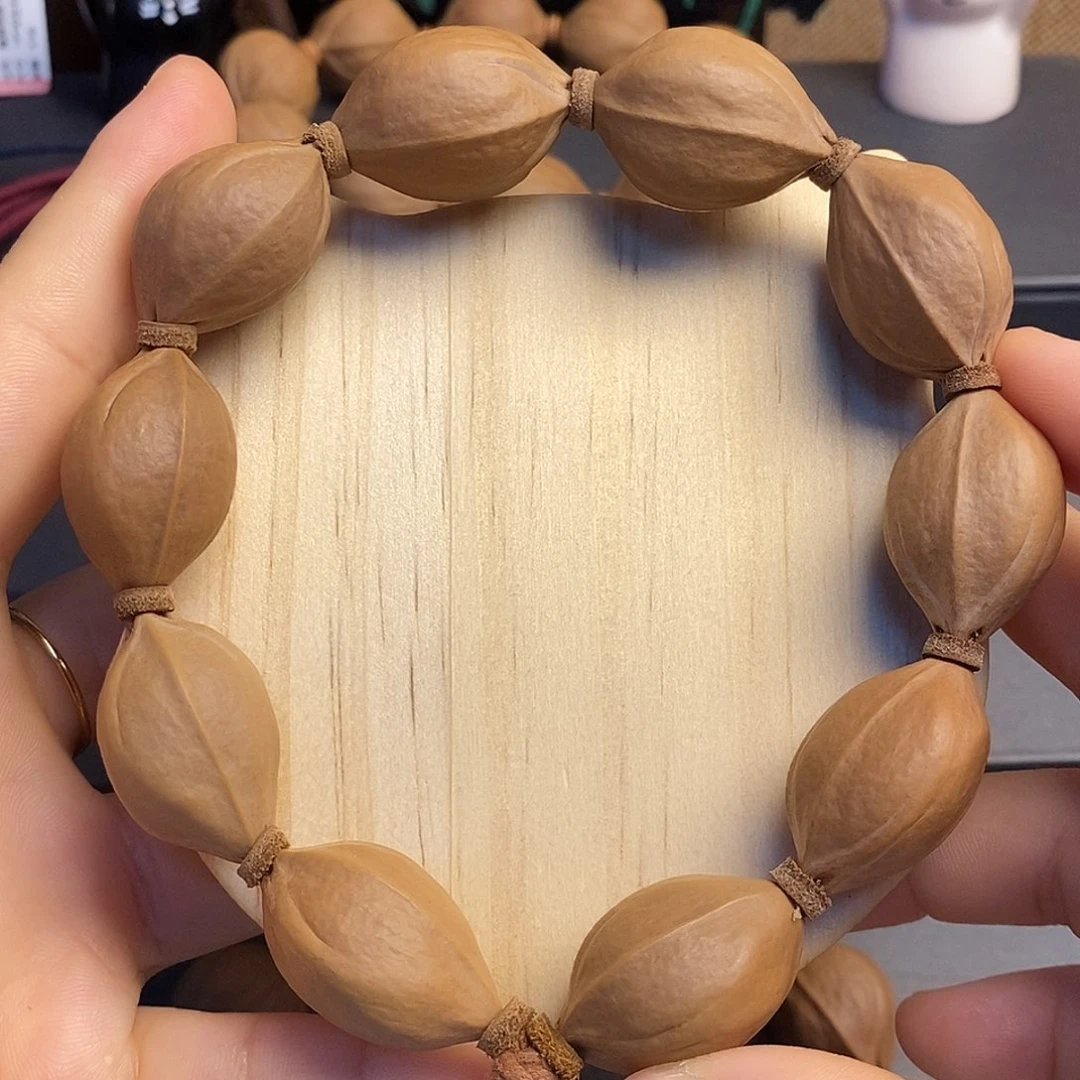 橄榄核手串/手链梅林铁核19/28左右（三花）