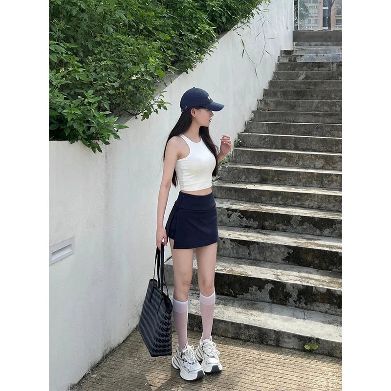 2025辣妹纯欲穿搭休闲百搭高级感白色吊带背心高腰显瘦开叉半身裙