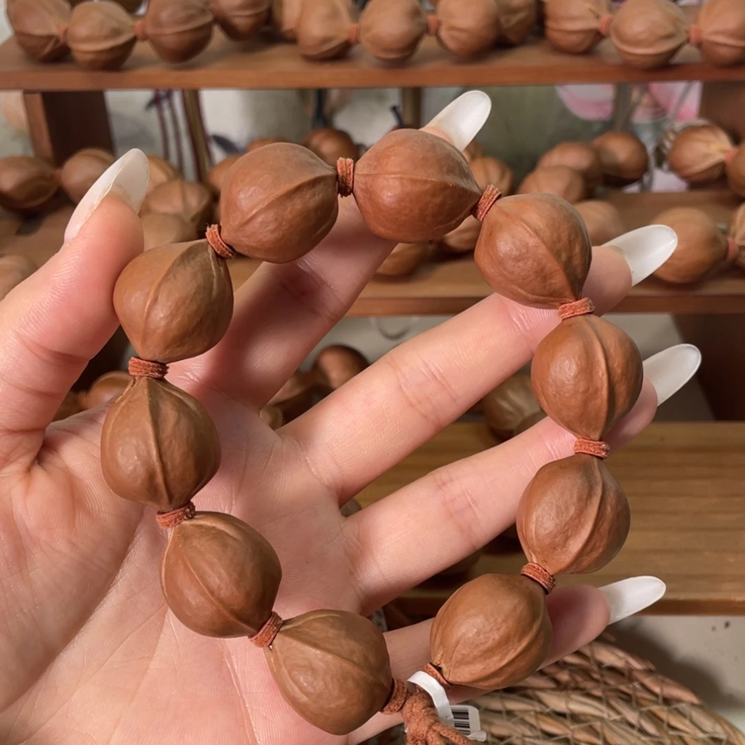 凉***я橄榄核手串/手链2025梅林铁核