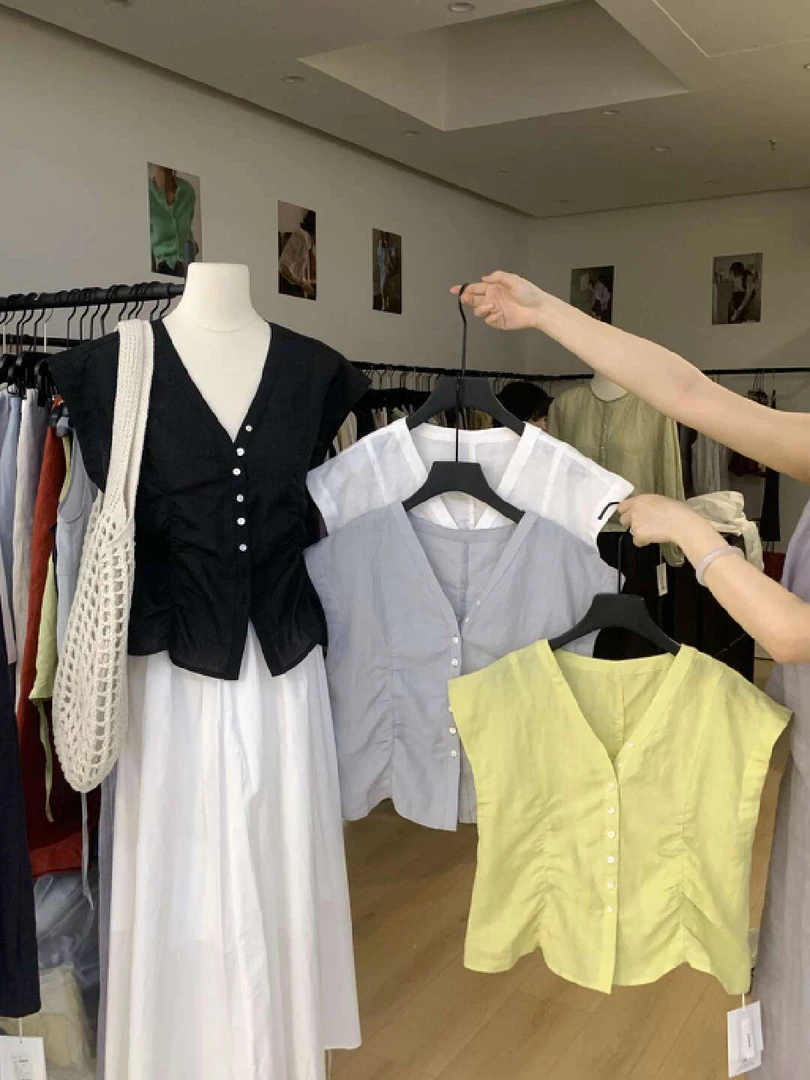 恩熙·新款韩系时尚简约V领无袖上衣25387