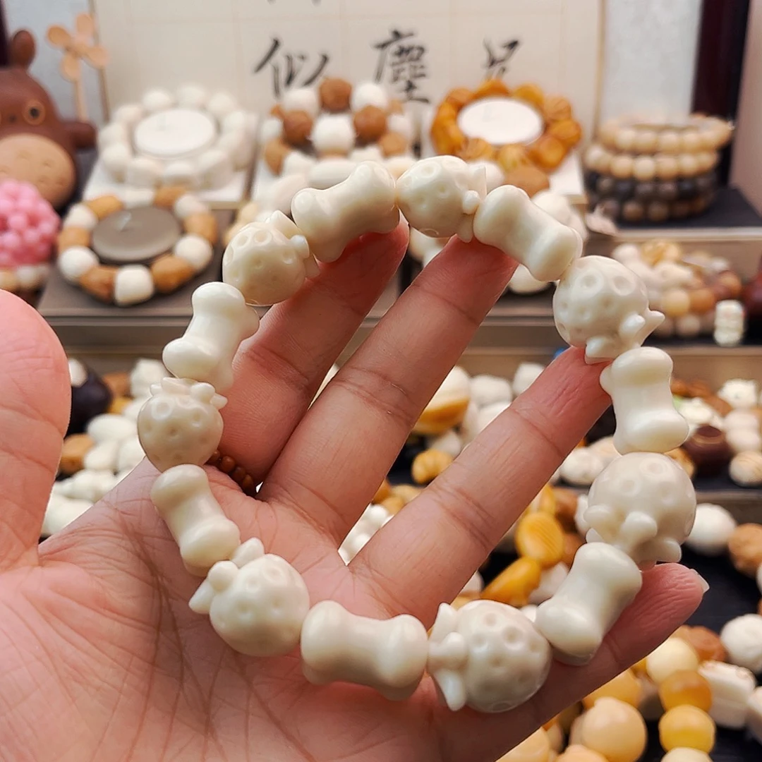菩提根/象牙果吊坠草莓骨头瑕不退换
