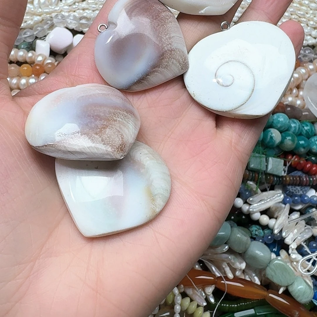 玛瑙/玉髓未镶嵌珠宝半成品一个40m螺化石吊坠