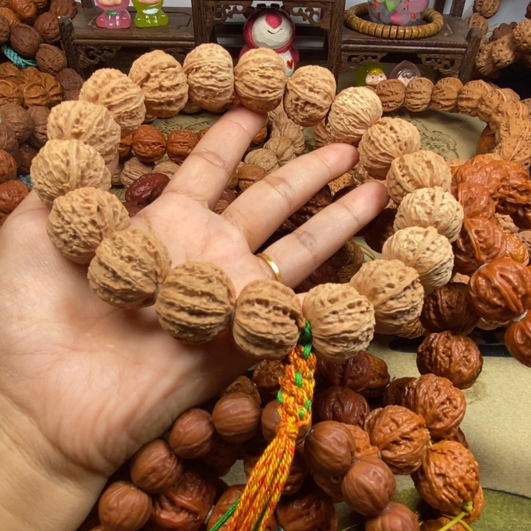 沉***间文玩核桃吊坠白茬八棱手持文玩核桃