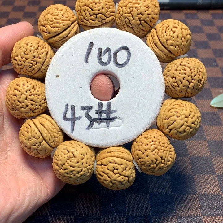 桃核手串不*?43号链接，