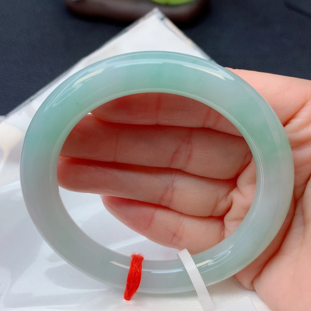 翡翠未镶嵌手镯56-57胶润果阳绿圆条