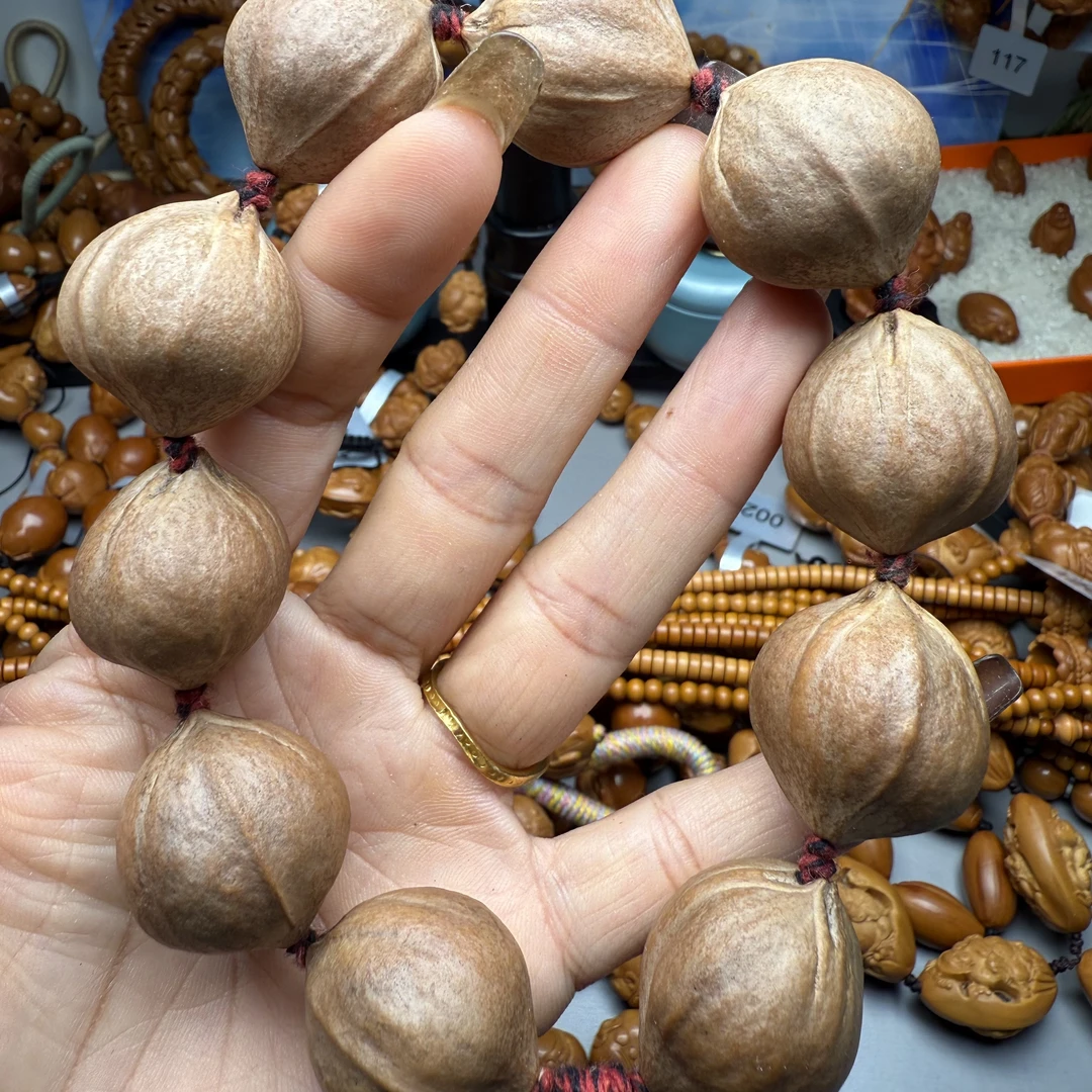 橄榄核文玩手串尺寸2.5左右铁核蒜头短圆素核