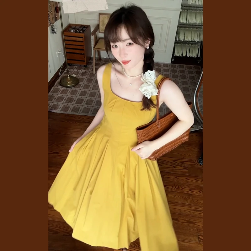 2823法式小个子黄色吊带连衣裙子女夏季2025新款海边度假收腰长裙