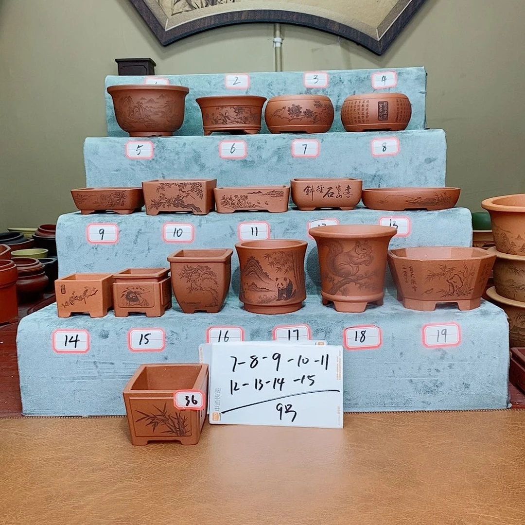 紫砂花盆一**硎我在看书