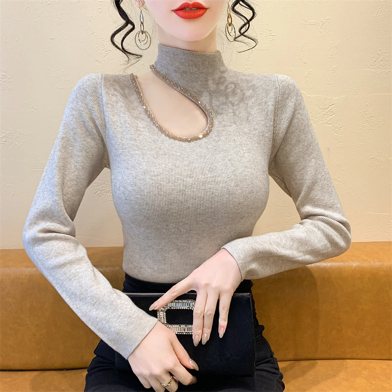 实拍秋冬新款高领洋气毛衣时髦气 质打底衫镂空露锁骨气质上衣