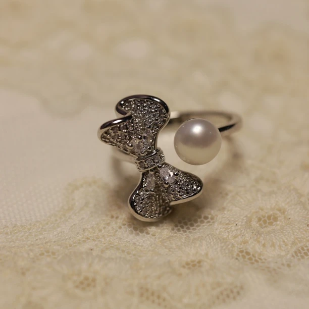 银色蝴蝶结满钻珍珠戒指JZ618