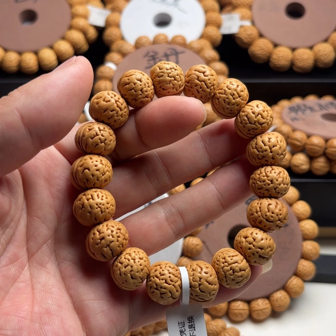 明***虫菩提籽类桃核手串盘锦我一道筋