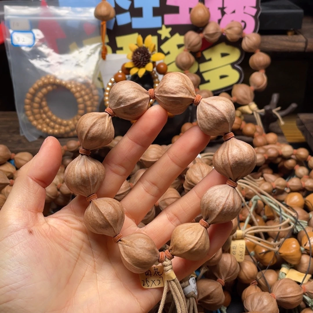 吃***烧橄榄核吊坠2527四花铁核
