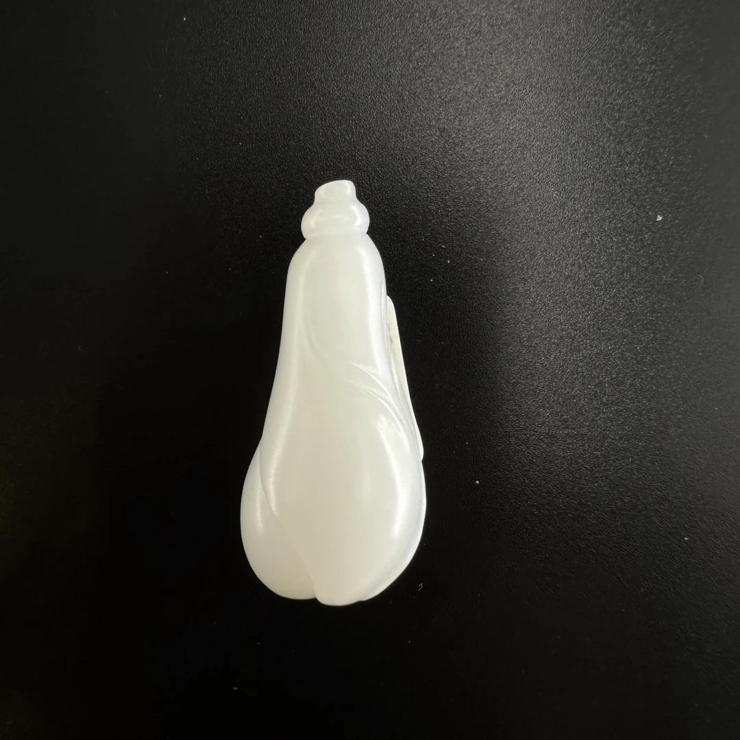 8羊脂白玉玉兰花挂坠/802623保利厦门拍卖