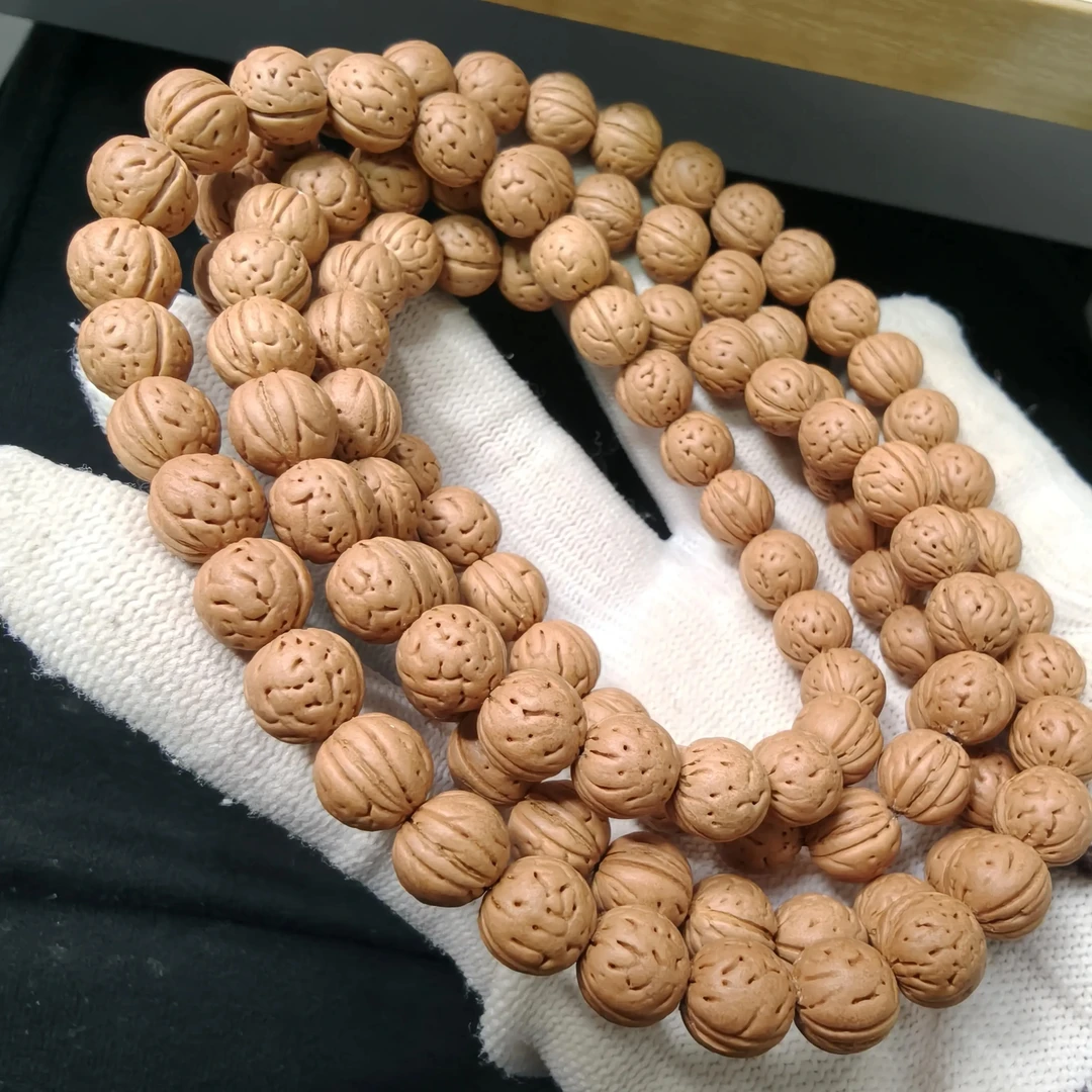 9+mm正圆货头小高端龙珠脖挂桃核手串