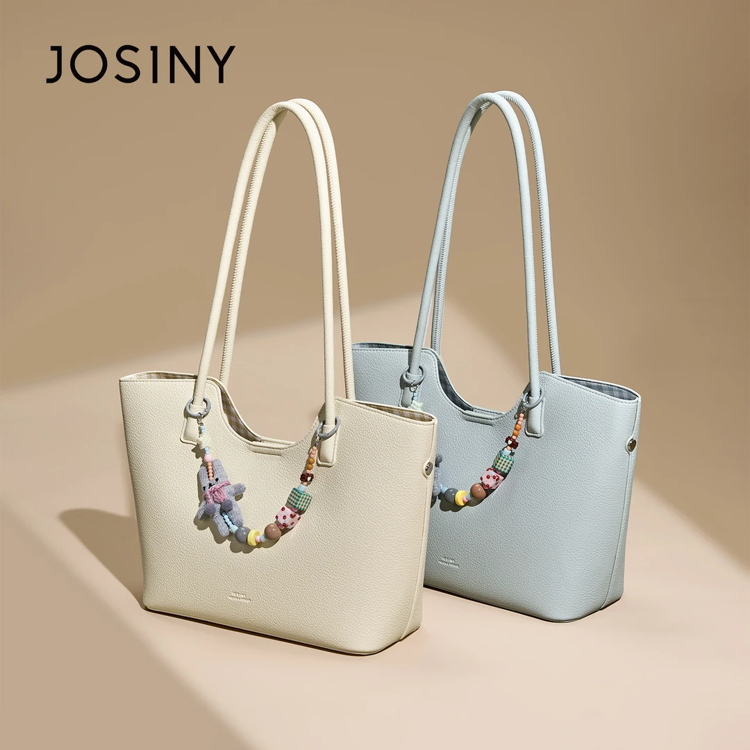 卓诗尼2025新款时尚百搭单肩斜挎包女高级感小众设计手提水桶包女