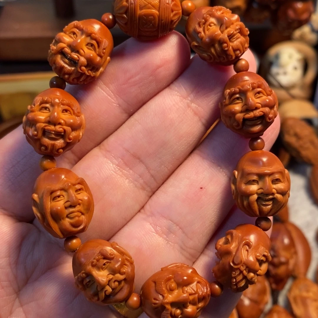 贫***来橄榄核吊坠1.6老油核文娟双面须派十八罗汉手串