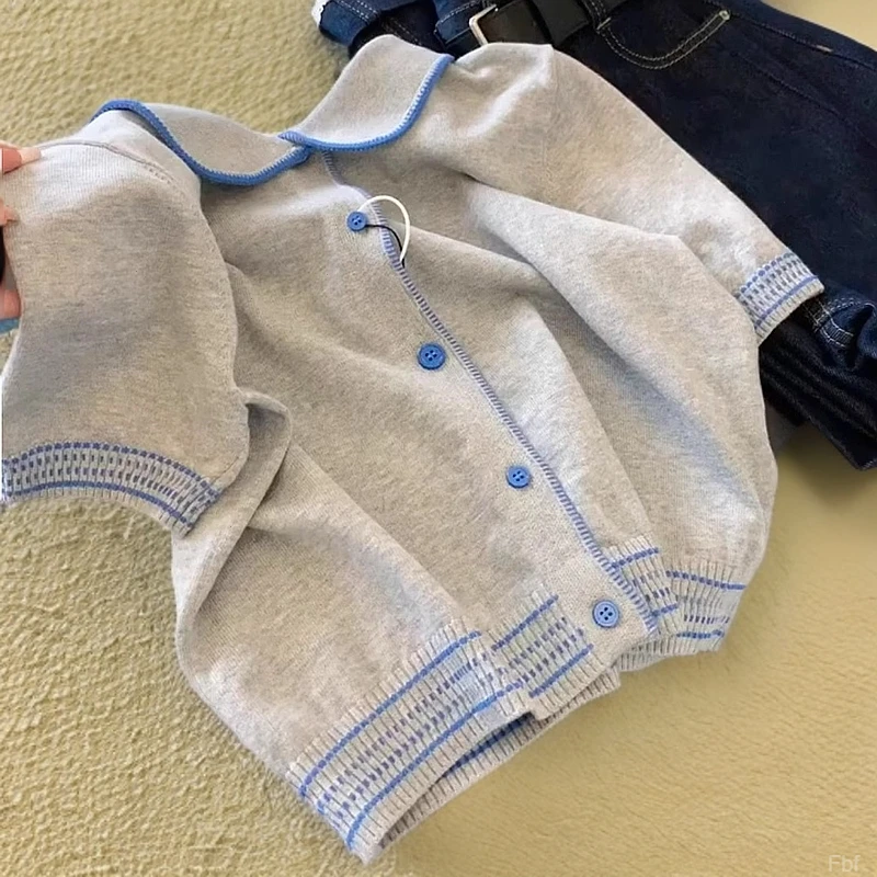 广州十三行高端爆款~气质娃娃领针织衫女2025新款夏季时尚上衣潮