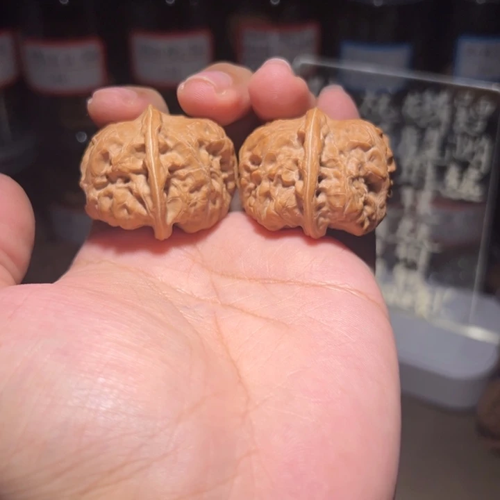 文玩核桃把件38门头沟元宝粉红皮