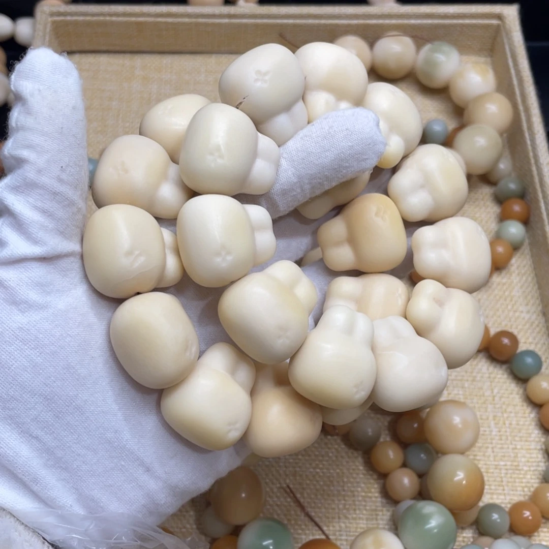 菩提根/象牙果吊坠27干磨大瑕疵牙果兔头一锅590