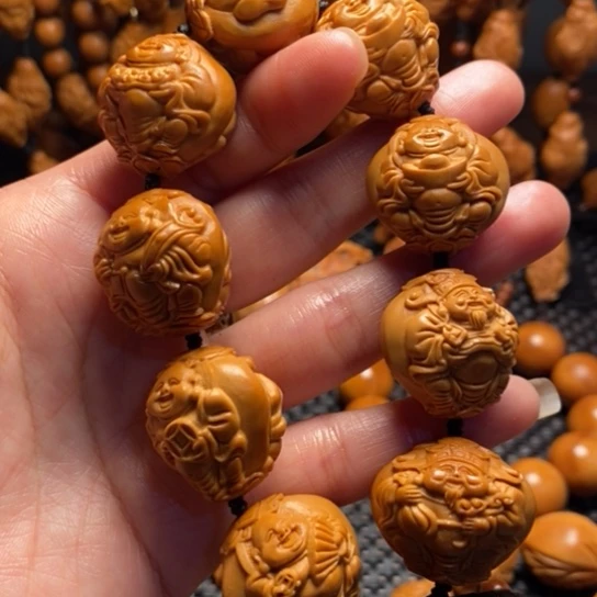 橄榄核吊坠W***Z浮雕财弥