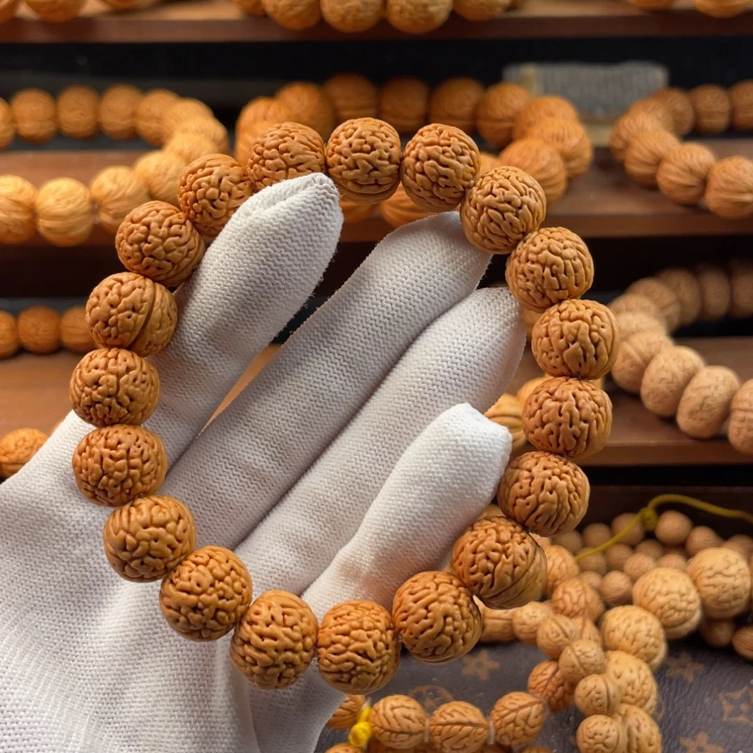 王***桃核吊坠野生盘龙