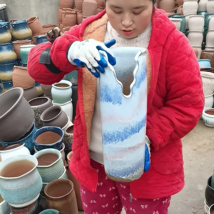 红陶口14高42瑕疵一个