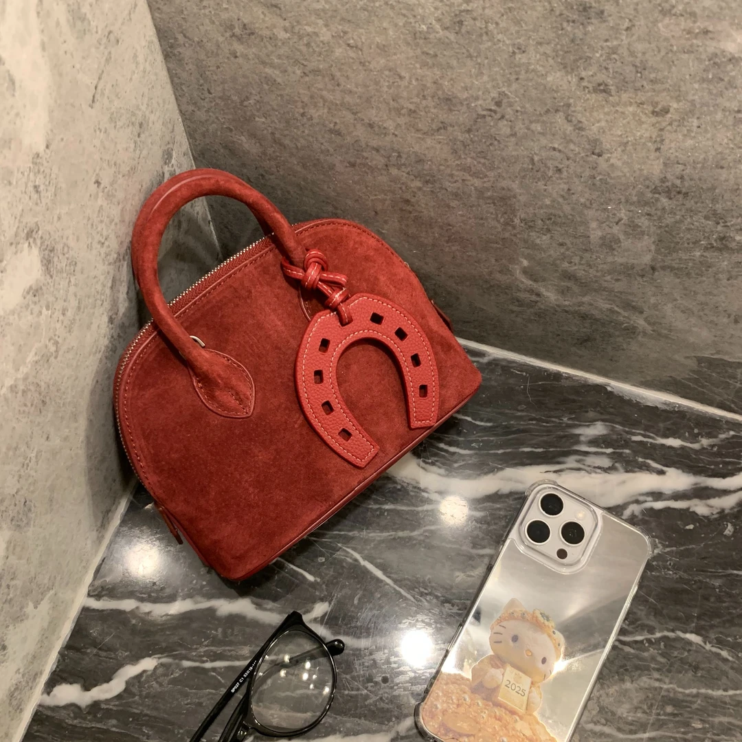 牛反绒 铁锈红贝壳包 b111
