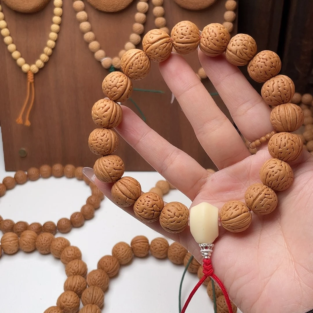 15加野生灯笼桃核手持