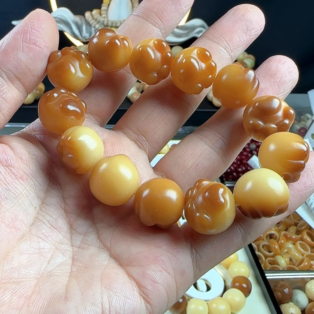 菩提根/象牙果手串一****年瑕疵爱心猫抓手串一条