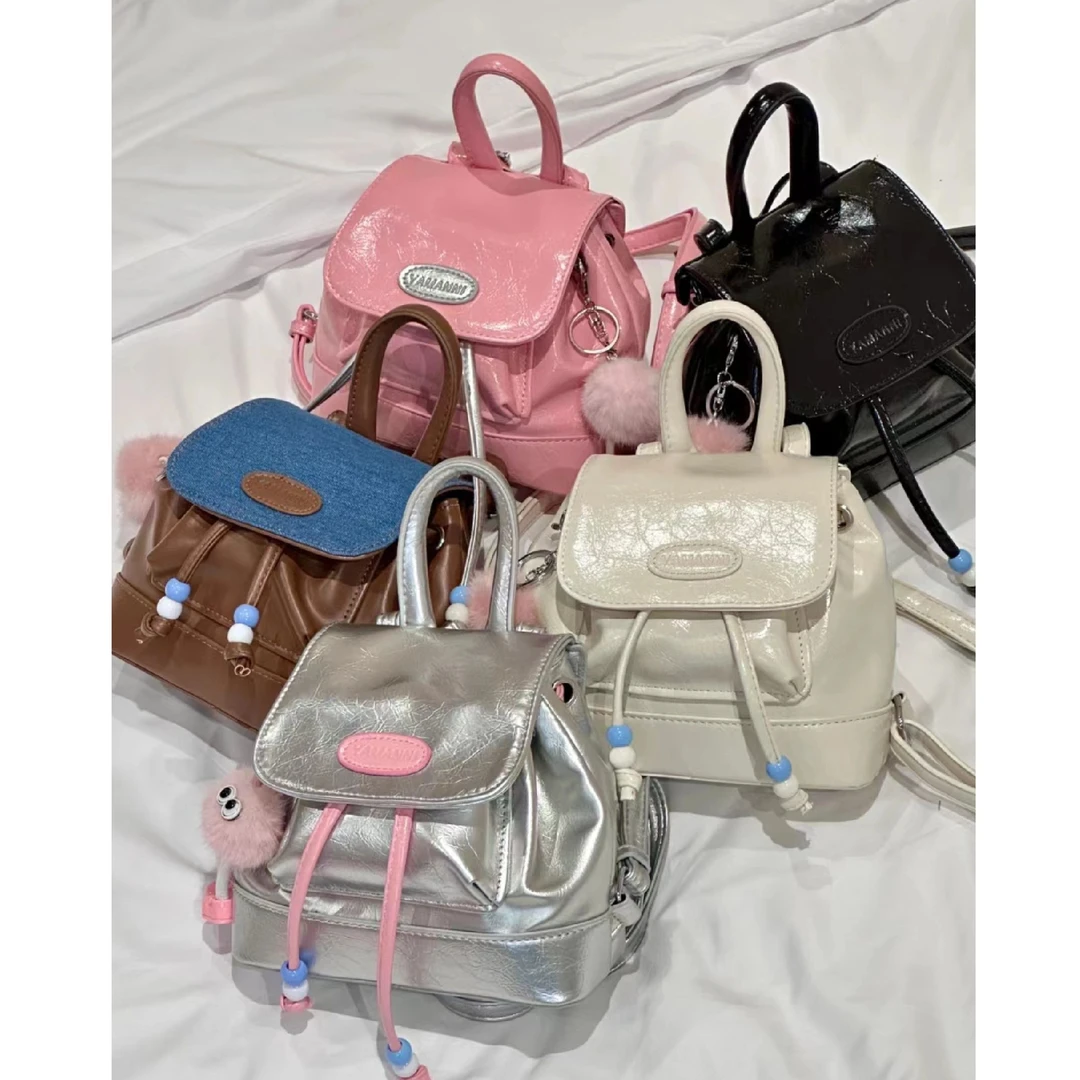 棕色银色双肩包包女2025新款潮复古水桶包学生百搭时尚休闲手提包