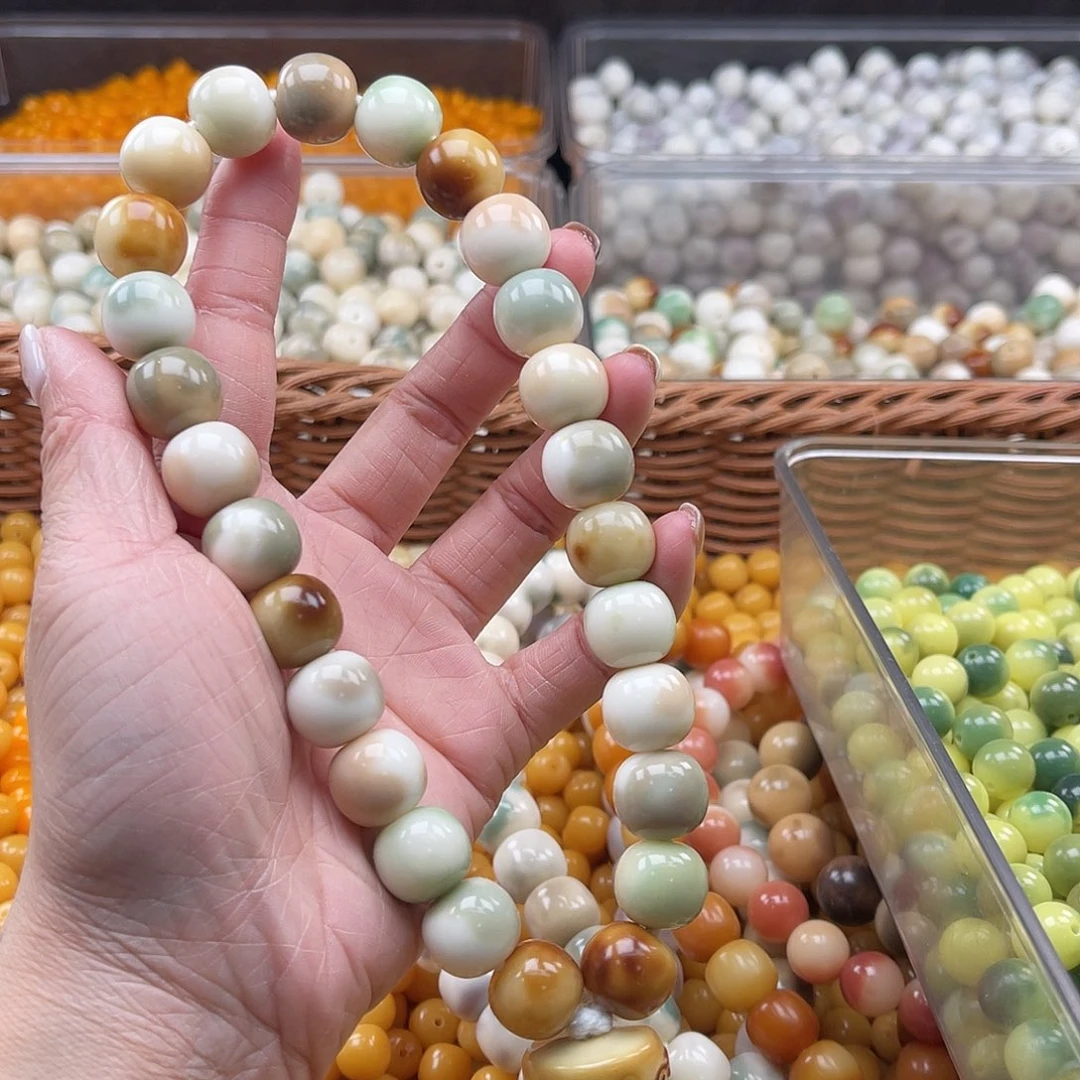 白玉菩提吊坠会**橙A/14mm/1条手持