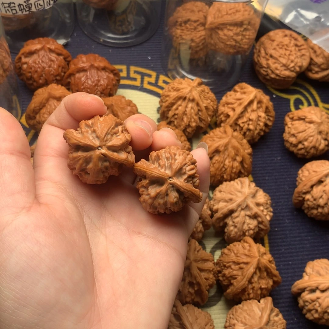 文玩核桃吊坠小****爸红樱枪52.5