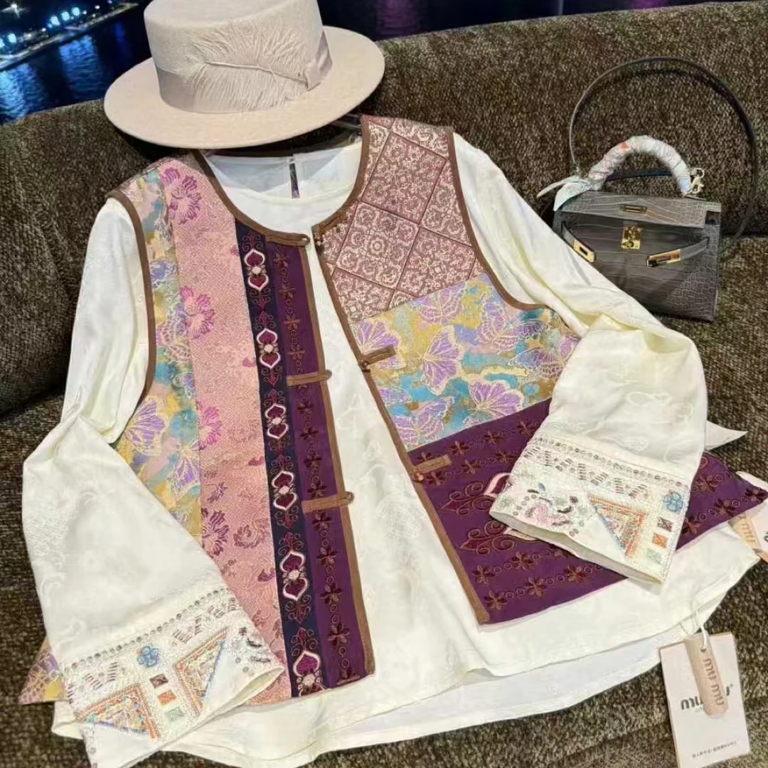 691512新中式国风重工刺绣盘扣提花蓝色马甲女秋冬气质