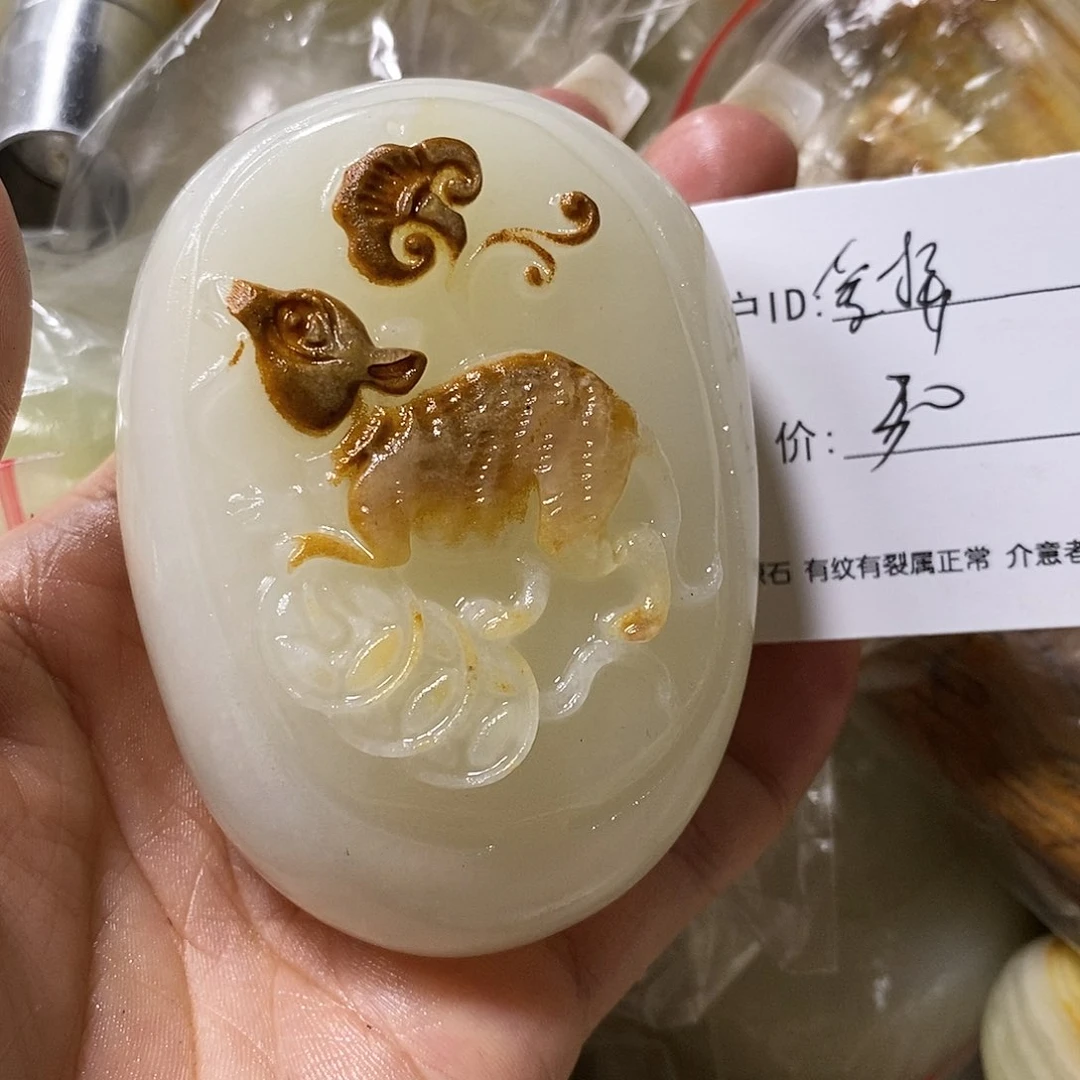 石材爱****。古青石手把件