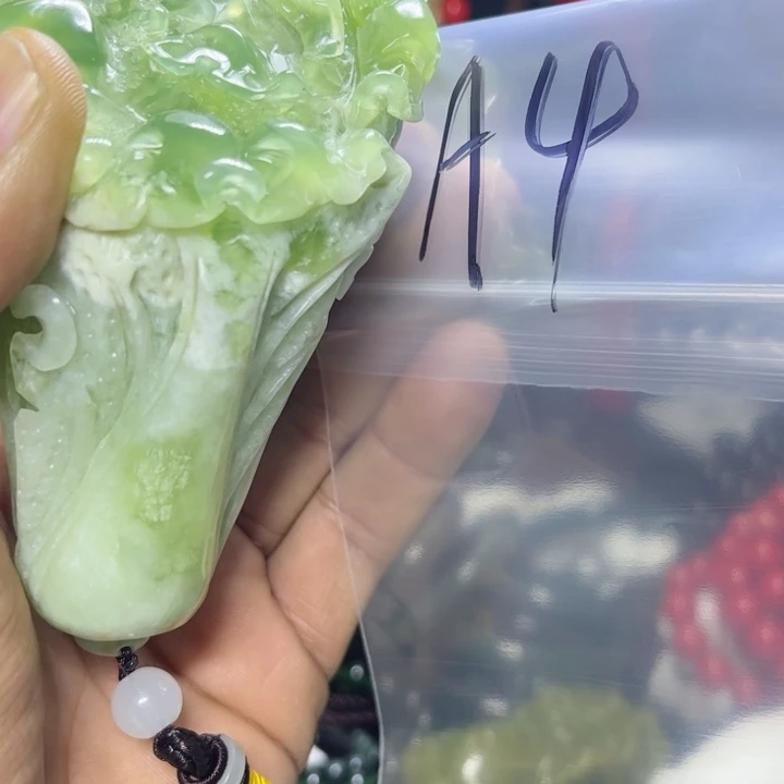 蛇纹石玉手把件未镶嵌女****族