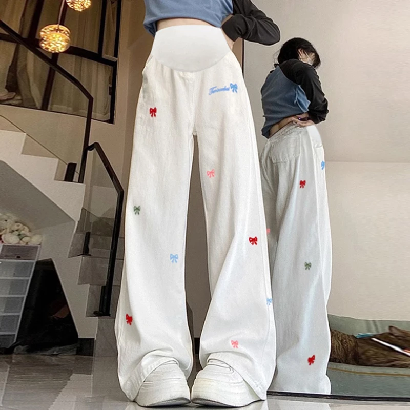2025新款孕妇牛仔裤春秋季白色刺绣托腹休闲窄版阔腿外穿长裤子女