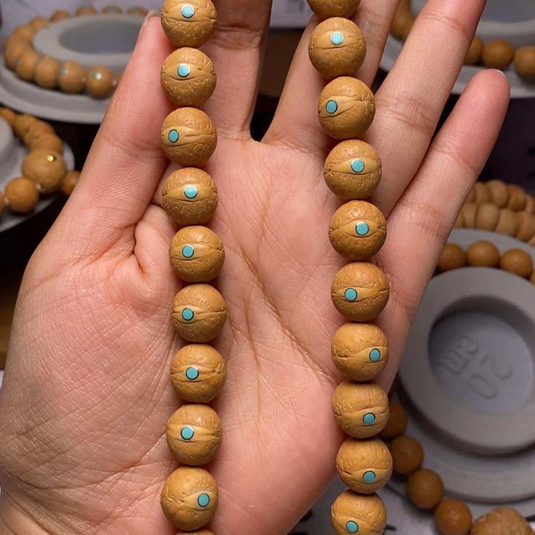 凤眼菩提吊坠手持