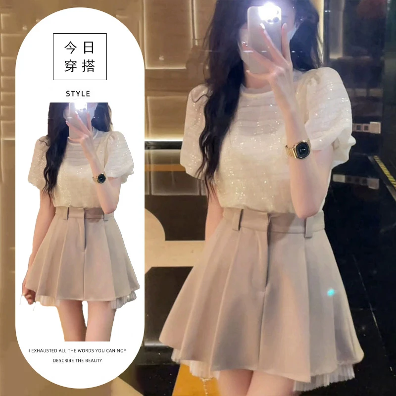 温柔风穿搭套装女夏季法式气质独特泡泡袖上衣搭配高腰百褶短裙潮