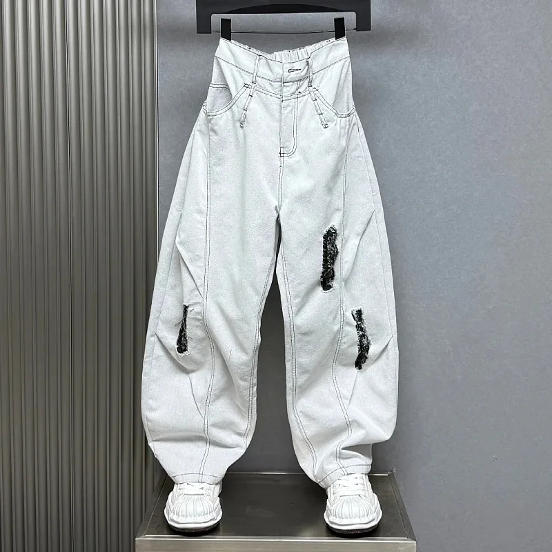 夏季新款美式高街破洞个性刮烂直简阔脚牛仔裤男生宽松大码弯刀裤