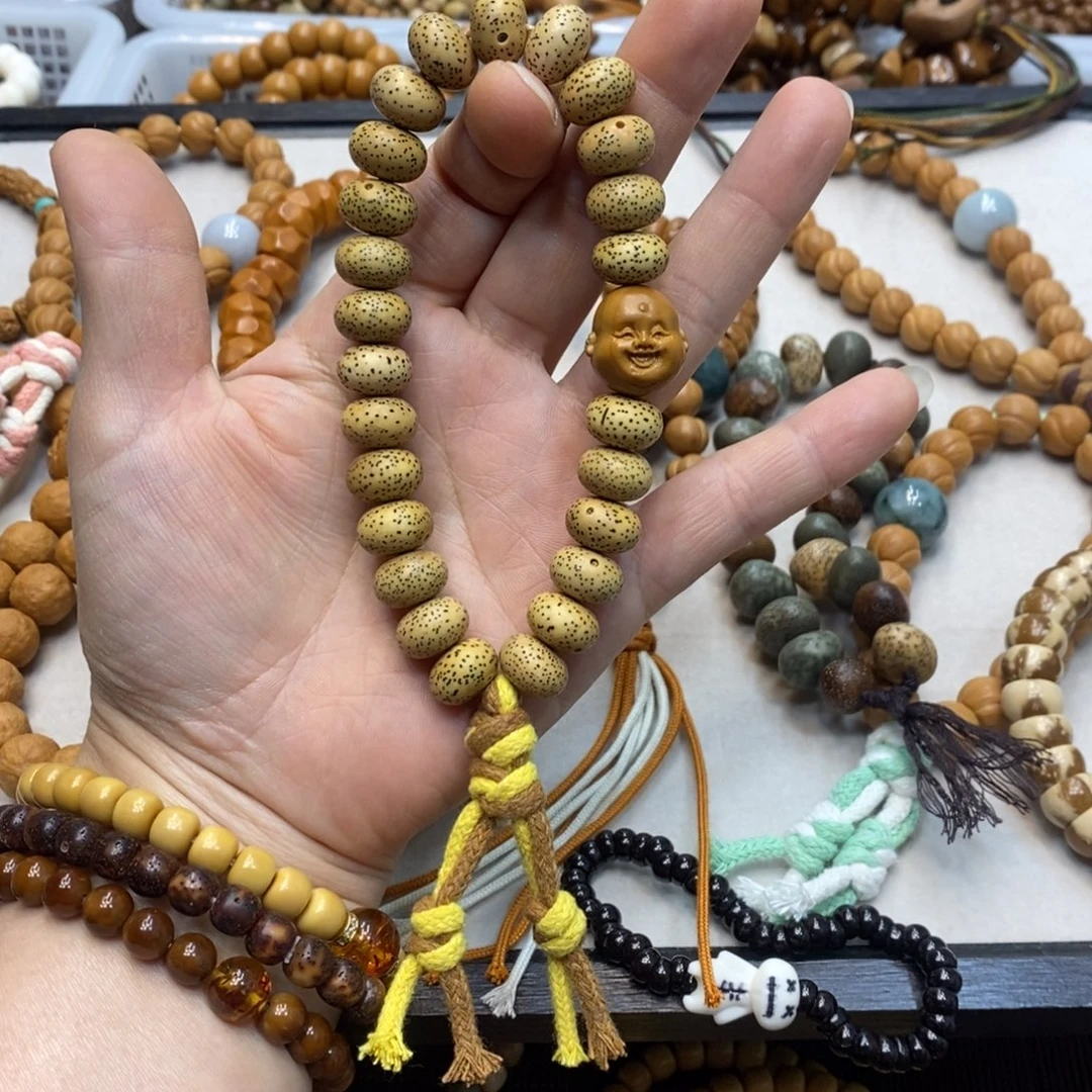 白玉菩提吊坠黄金底星月双盘珠手持