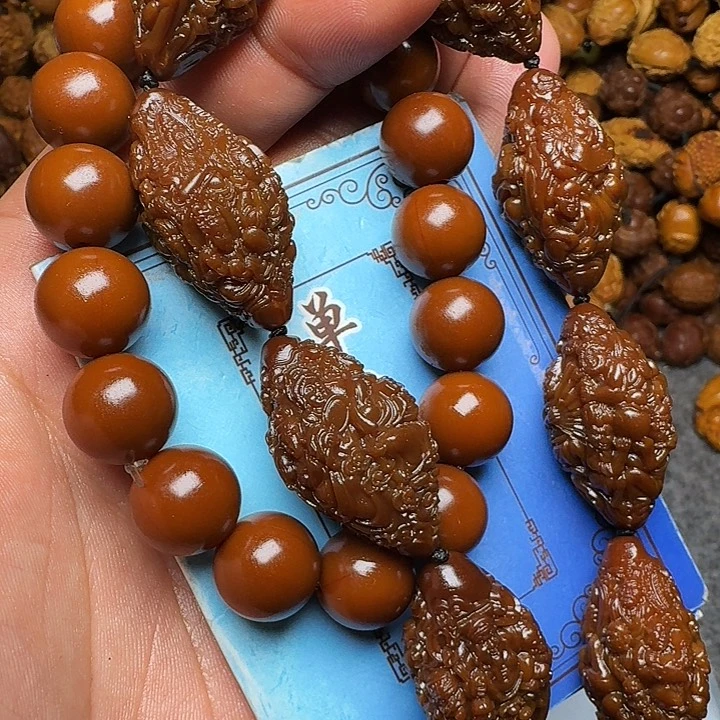 橄榄核吊坠你的电话怎么