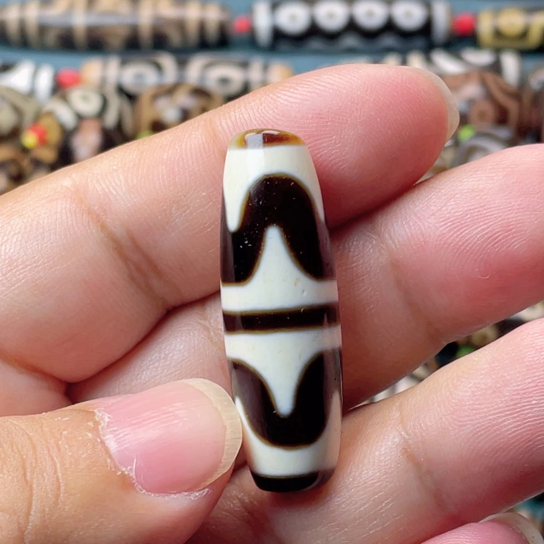 玛瑙/玉髓未镶嵌颈饰朱砂双牙牙