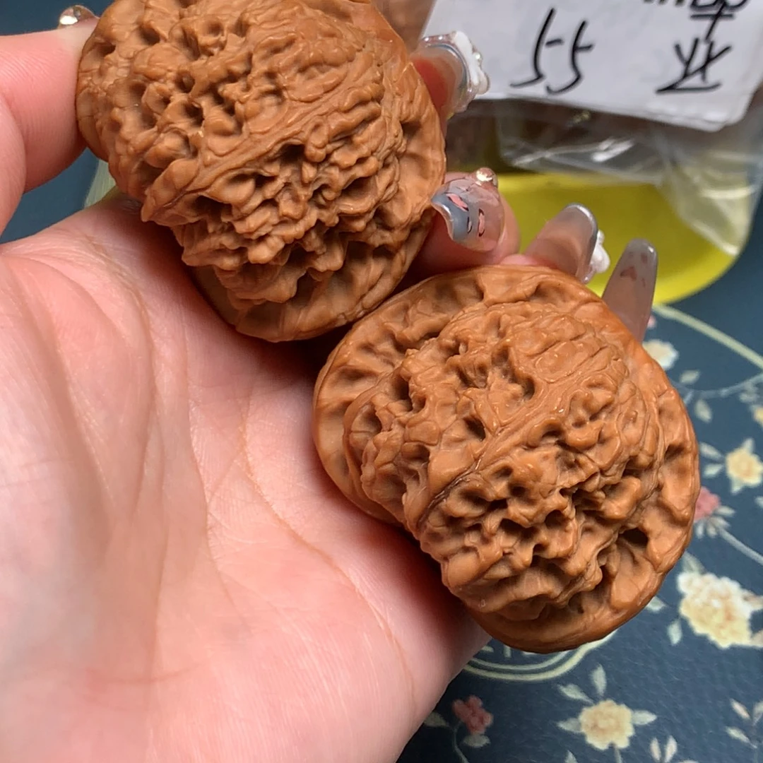 杨***杰文玩核桃把件47-26408-8