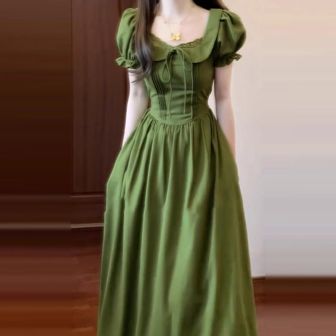 法式绿色泡泡袖连衣裙子女夏季2025新款大方得体独特漂亮掐腰长裙