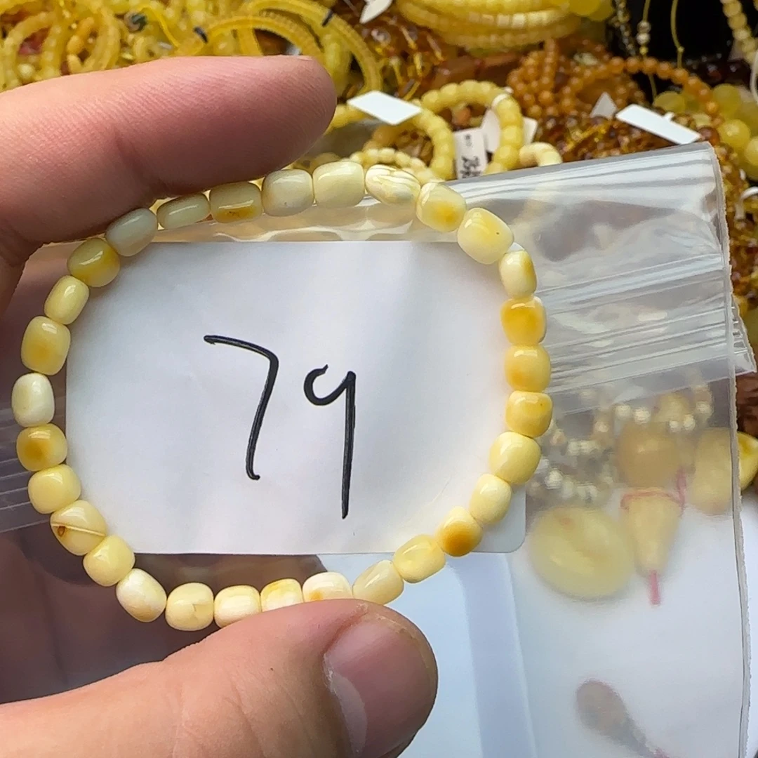W***W裸石琥珀未镶嵌蜜蜡串3.56克