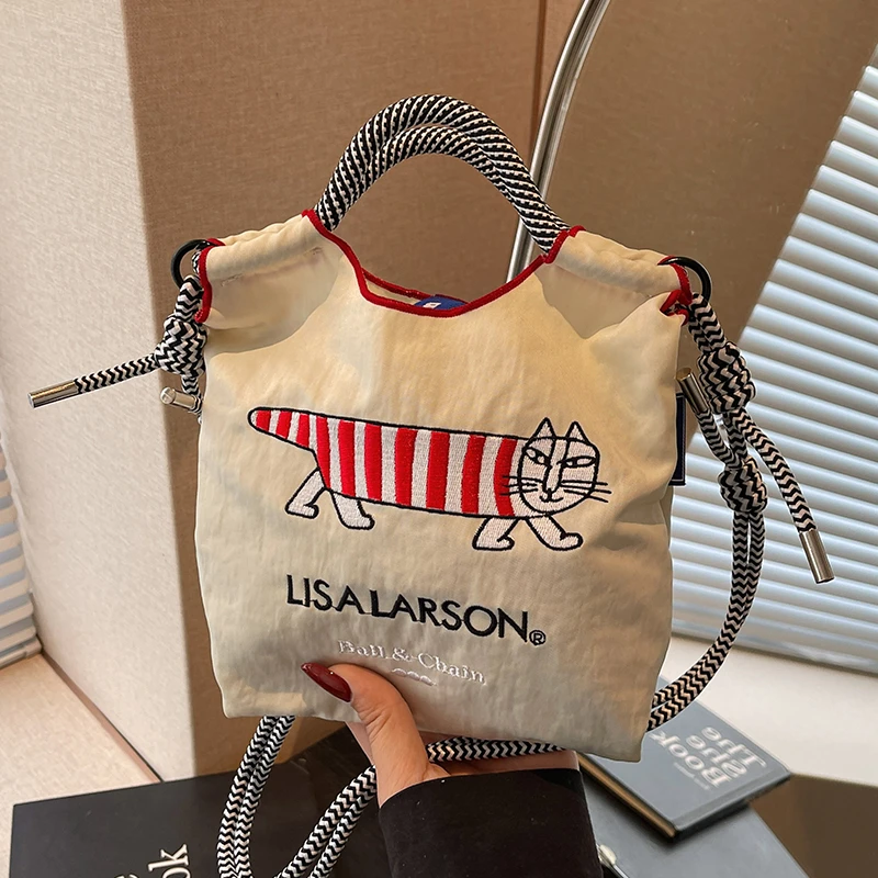 甜甜圈刺绣工艺包包女2025新款时尚单肩斜挎包轻便百搭通勤手机包