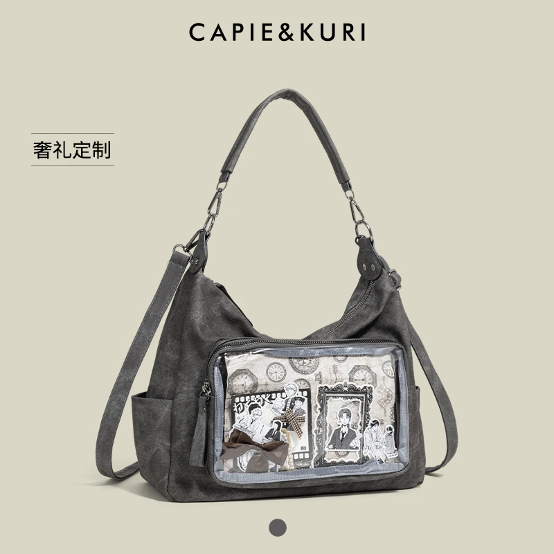 CAPIE&KURI日系牛仔纹单肩痛包女学院风二次元吧唧通勤单肩斜挎包