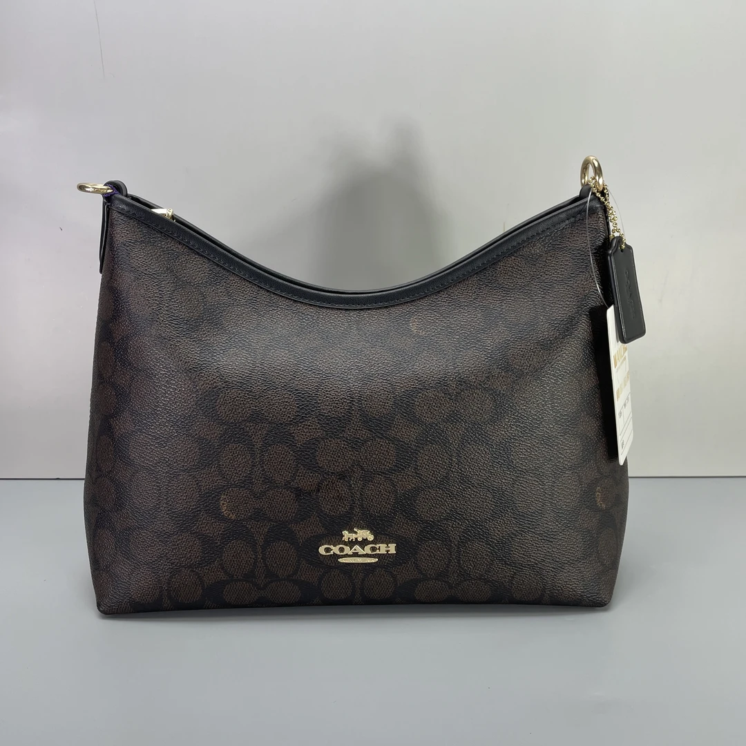 99新 COACH/蔻驰 laurel31老花流浪包31*24*11cmE062301