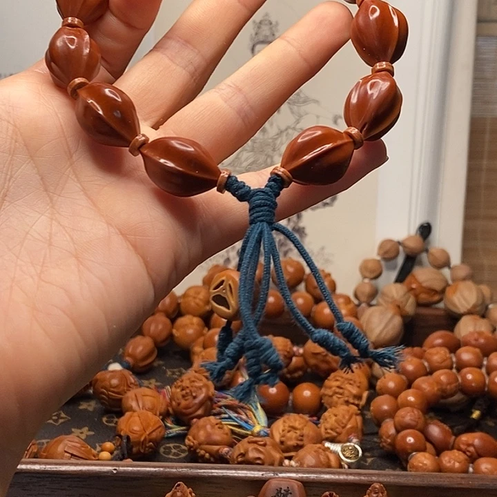 钧***橄榄核手串/手链1.5素核铁