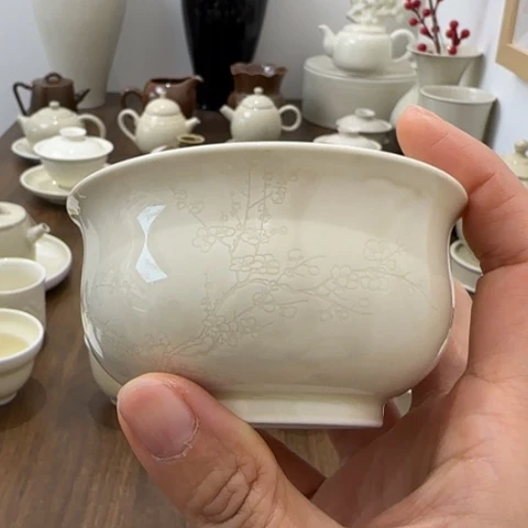 微瑕定瓷梅兰花主人杯窑变